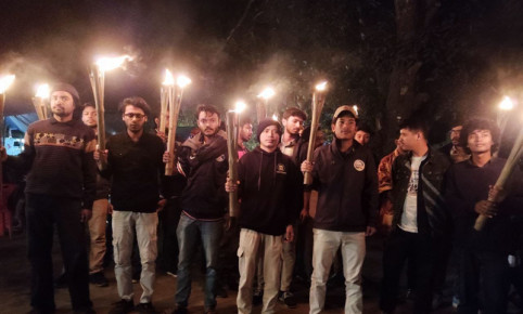 ঢাকায় আদিবাসীদের উপর হামলার প্রতিবাদে রাবিতে মশাল মিছিল