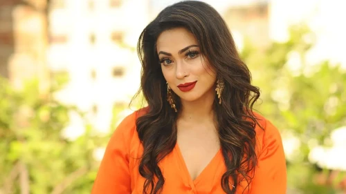 স্বামীকে নিয়ে জমি দখলের চেষ্টা নায়িকা পপির