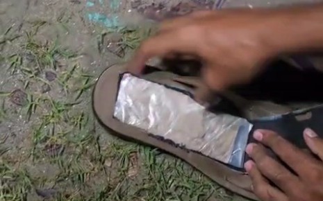 রাজশাহীতে মাদক কারবারীর স্যান্ডালের ভেতর মিললো ১২০ গ্রাম হেরোইন