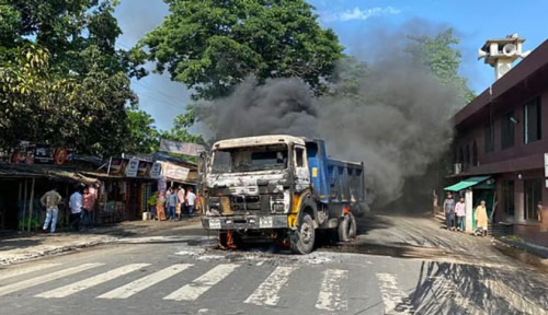 রাজশাহীতে সড়কে প্রাণ গেল ব্যবসায়ীর, আগুনে পুড়ল দুই ডাম্প ট্রাক